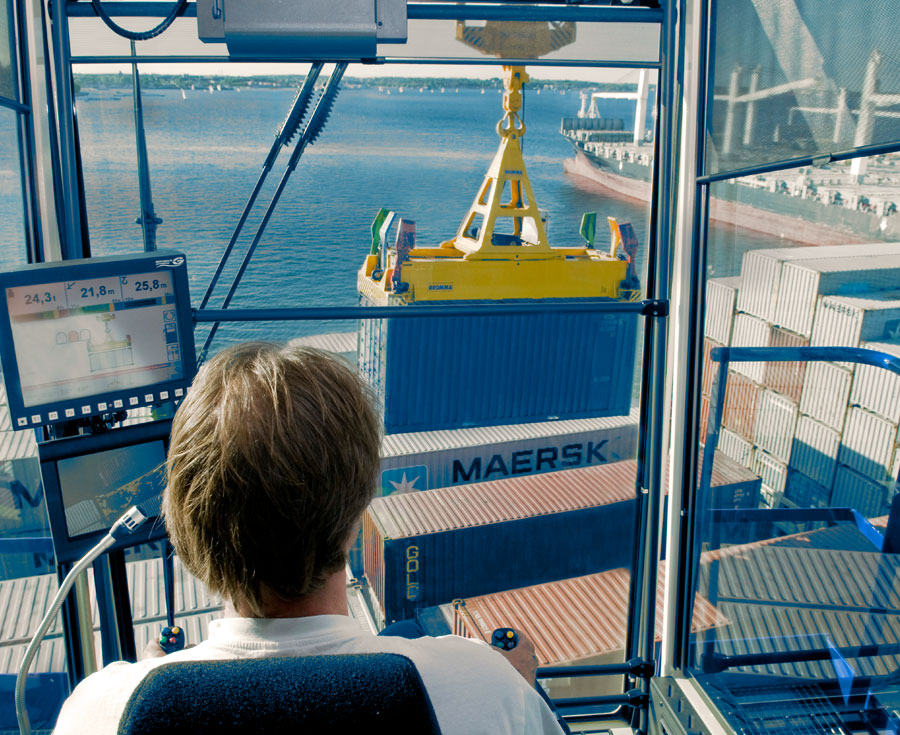 Container handling with crane from the crane driver's perspective.