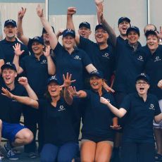 Cheering employees after a sporting event.